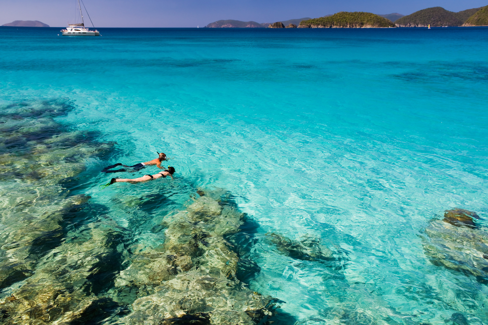 couple on a snorkeling day trip tour in turks and caicos